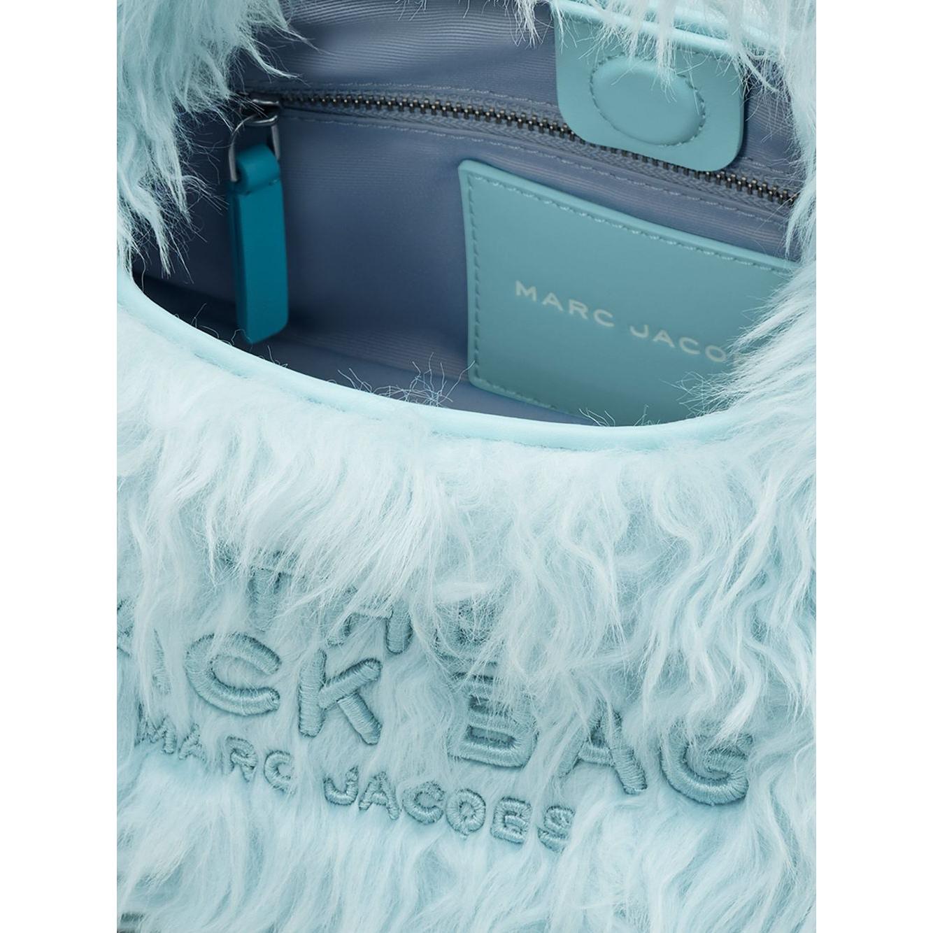 Marc Jacobs Marc Jacobs The Mini Faux Fur Sack Tote Bag blue faux-fur design magnetic fastening single top handle embroidered logo to the front main compartment internal zip-fastening pocket internal card slot internal logo stamp full lining mini The Sack