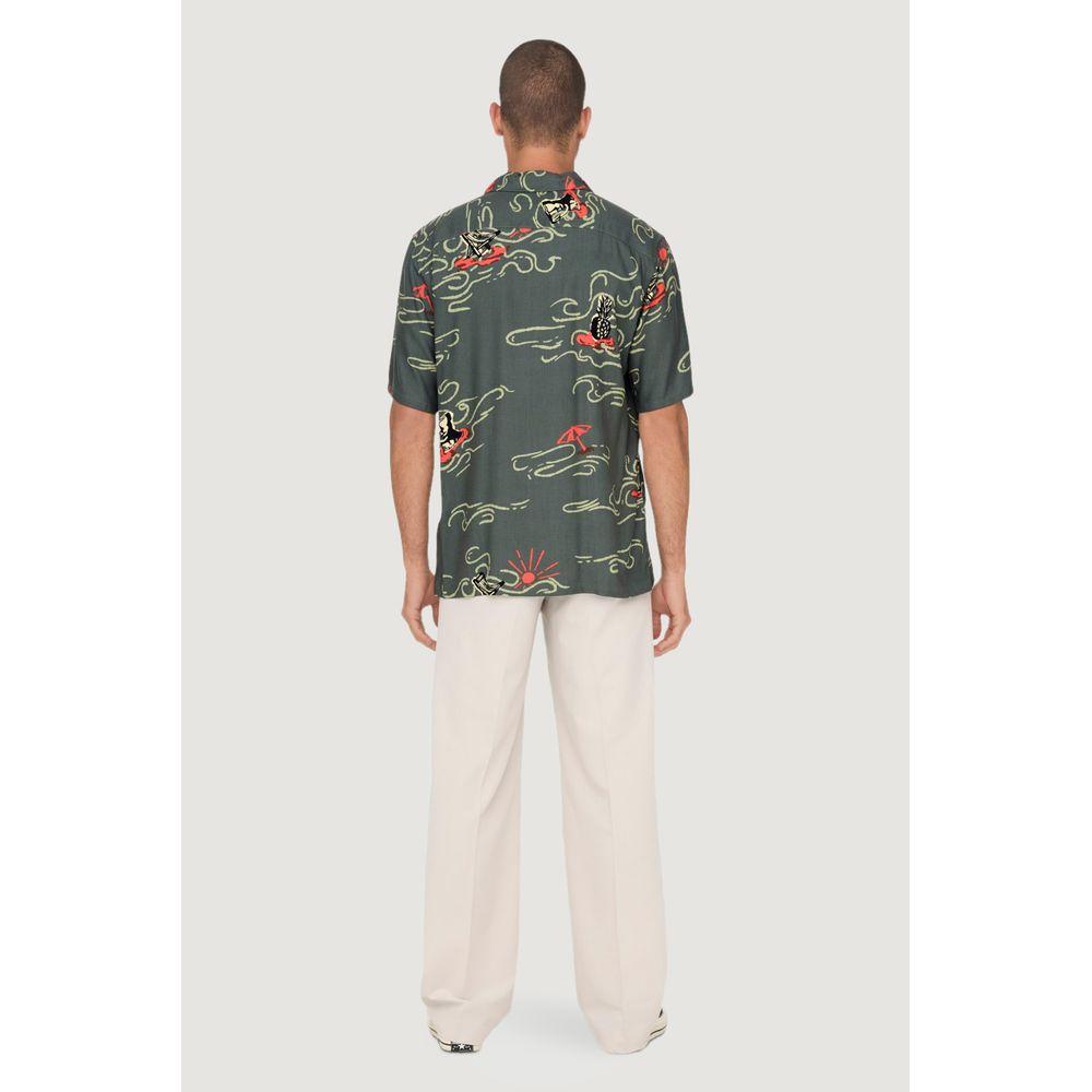 Back view of Only & Sons green viscose shirt with artistic prints, paired with light trousers.