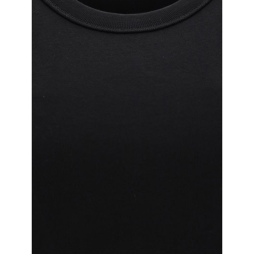 Loulou De Saison Tank TopLou Lou Studio’s Cotton Tank Top is an essential garment with a simple, refined design. With a ribbed crew neck and a mélange pattern that adds depth, it offers a comfortable and versatile fit. Perfect for a casual and cool look,