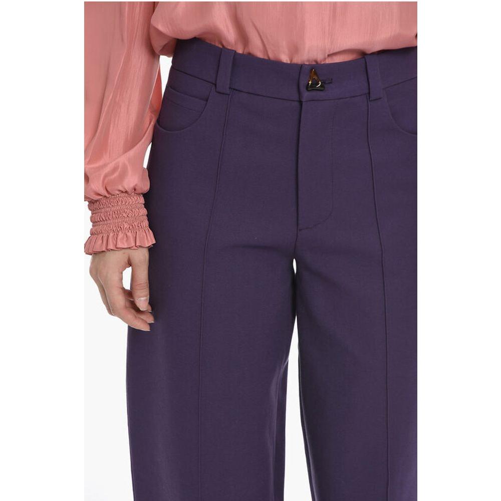 Aeron Wool EDGE Pants with Decorative ButtonDescription: Details: Autumn-Winter Normal waisted Purple 5 pockets Buttons Zip closure Belt loops Front closure Festive Look P553808 Converted from FR size