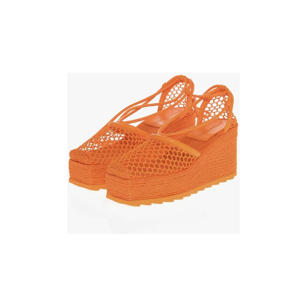 Bottega Veneta Meshed Wedged Lace-Up Espadrilles with Leather TrimmingsDescription: Details: Spring-Summer Orange Rubber sole Lace-up P600034 HEEL: 9 CM PLATFORM: 3 CM