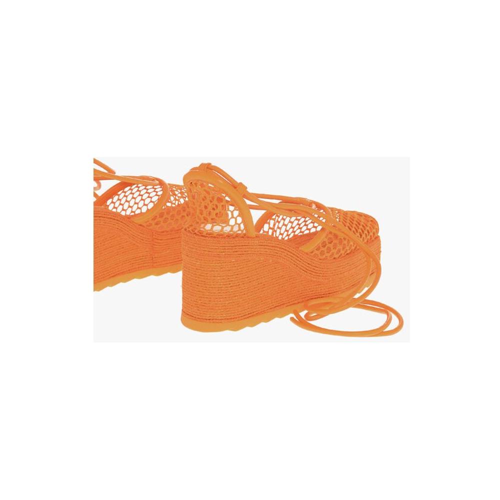 Bottega Veneta Meshed Wedged Lace-Up Espadrilles with Leather TrimmingsDescription: Details: Spring-Summer Orange Rubber sole Lace-up P600034 HEEL: 9 CM PLATFORM: 3 CM