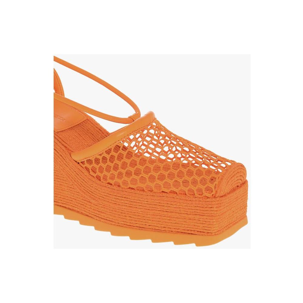 Bottega Veneta Meshed Wedged Lace-Up Espadrilles with Leather TrimmingsDescription: Details: Spring-Summer Orange Rubber sole Lace-up P600034 HEEL: 9 CM PLATFORM: 3 CM