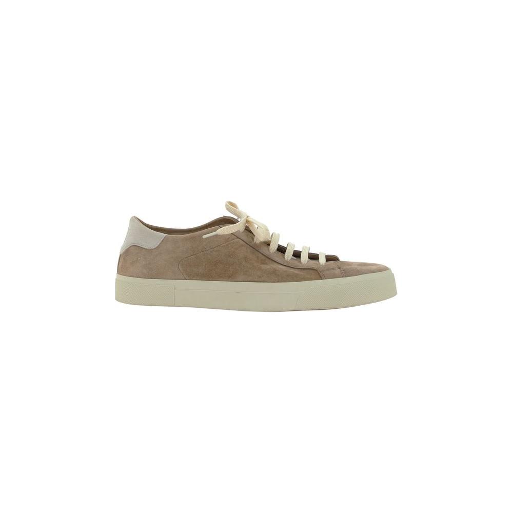 Brunello Cucinelli SneakersCalfskin Snekaers by Brunello Cucinelli featuring a round toe front, a suede design, a lace-up front fastening, a contrasting signature brand print label at the heel, and a branded insole.
