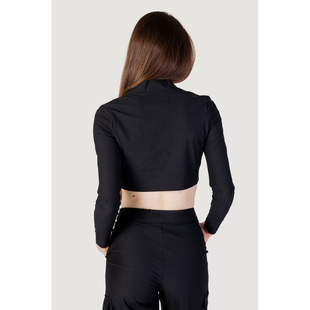 Back view of a woman wearing Calvin Klein Jeans Black Recycled Polyester Top with high collar and long sleeves.