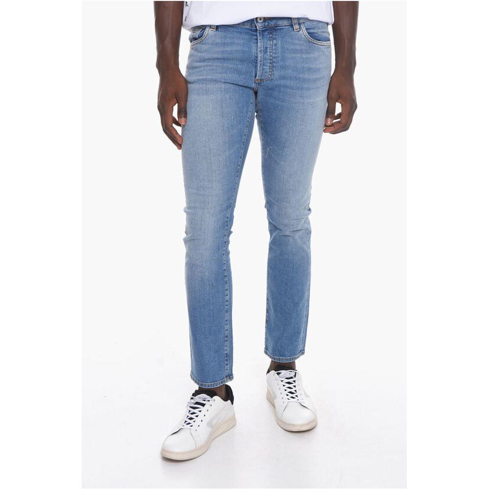 Marcelo Burlon Belt Loop TEMPERA CROSS Slim Fit Denims 17cmDescription: Details: STREET CHIC Autumn-Winter Light blue Light wash Buttons Denim cotton Belt loops Logo Print Made in Italy Straight-cut leg Casual Denim Rules P535155 Ankle 17cm