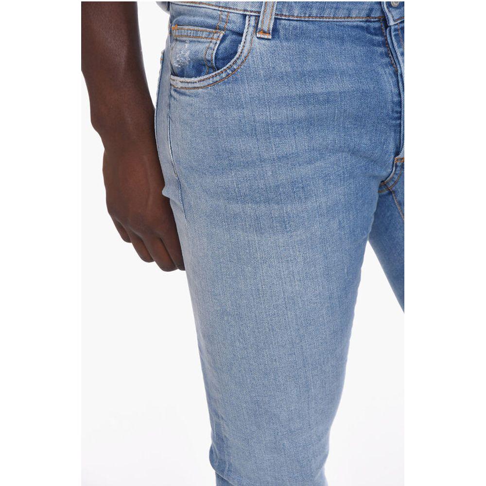 Marcelo Burlon Belt Loop TEMPERA CROSS Slim Fit Denims 17cmDescription: Details: STREET CHIC Autumn-Winter Light blue Light wash Buttons Denim cotton Belt loops Logo Print Made in Italy Straight-cut leg Casual Denim Rules P535155 Ankle 17cm