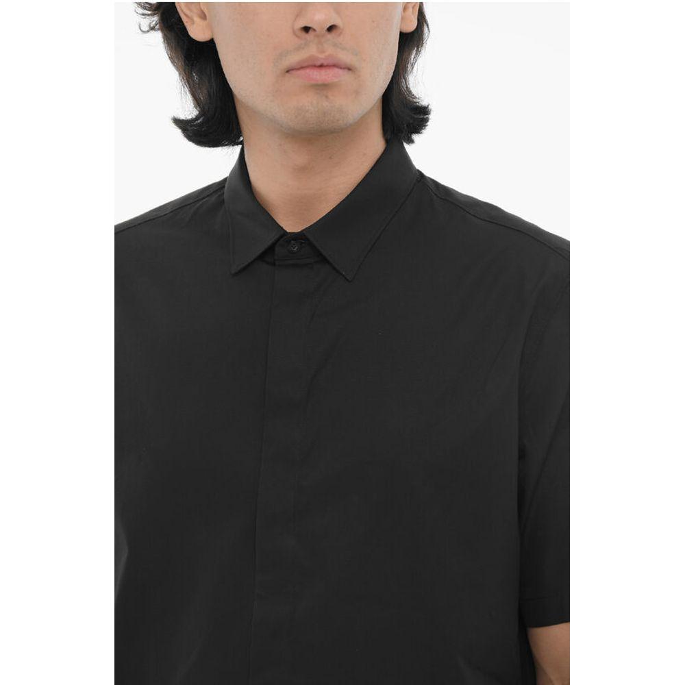 Neil Barrett Loose Fit Short Sleeves ShirtDescription: Details: Spring-Summer EU Preferential Origin (FTA/TCA) Black Buttons Short sleeves Front closure Hidden closure Made in Italy ST VALENTINE P612063 Loose Fit