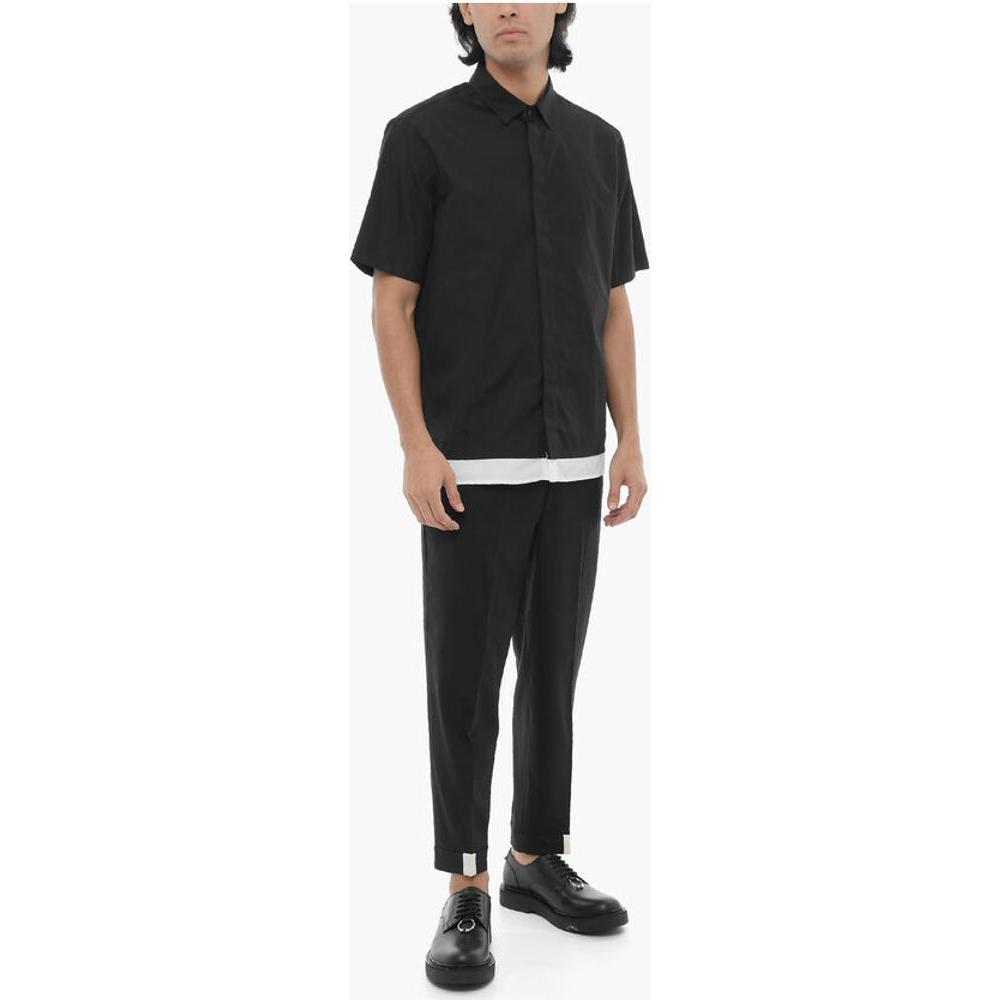 Neil Barrett Loose Fit Short Sleeves ShirtDescription: Details: Spring-Summer EU Preferential Origin (FTA/TCA) Black Buttons Short sleeves Front closure Hidden closure Made in Italy ST VALENTINE P612063 Loose Fit