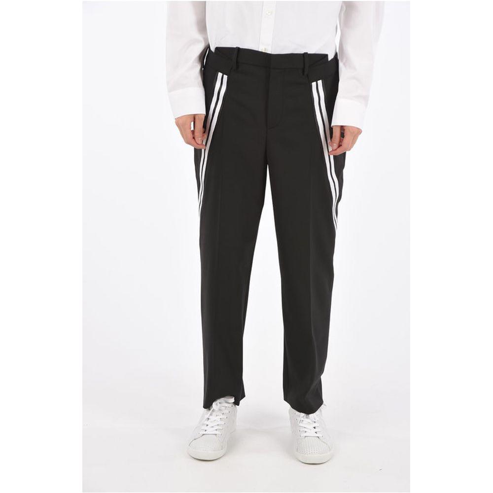Neil Barrett Mid-rise waist slim fit pantsDescription: Details: Spring-Summer Black Buttons Zip closure Belt loops Pockets Contrasting stripe Front closure Hidden closure Normal waisted Made in Italy Jetted pocket Zip closure pocket Pockets with Buttons P