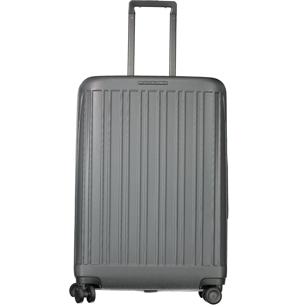 Piquadro Gray Polycarbonate Men LuggageEmbark on your next journey with Piquadro’s epitome of style and functionality. This medium trolley boasts a sleek gray polycarbonate shell adorned with striking contrasting details and the emblematic Piquadro logo.