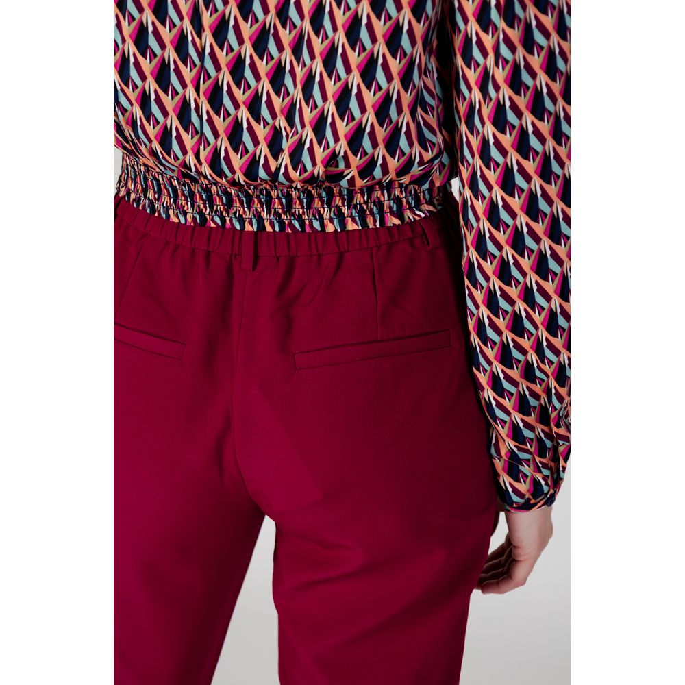 Back view of Vila Clothes Bordeaux Polyester Casual Pants showcasing stylish design and elastic waist.