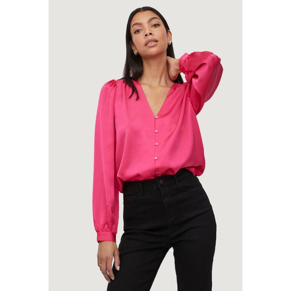 Model wearing Vila Clothes Pink Polyester Blouse with V-neck and long sleeves, highlighting its elegant and versatile style.