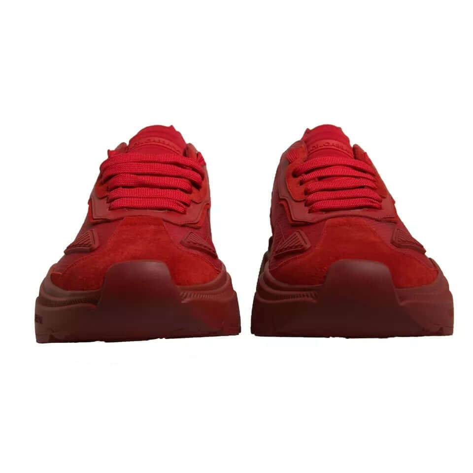 Dolce & Gabbana red leather DAYMASTER low top sneakers, front view, showcasing vibrant color and sleek design.