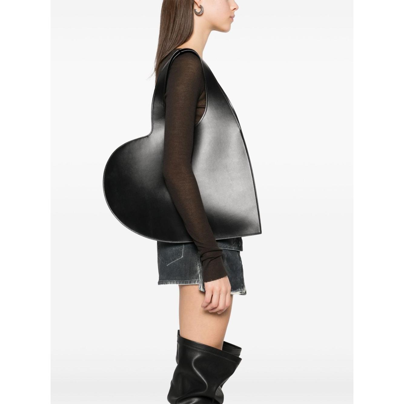 Front view with bag zipped and handles upright.