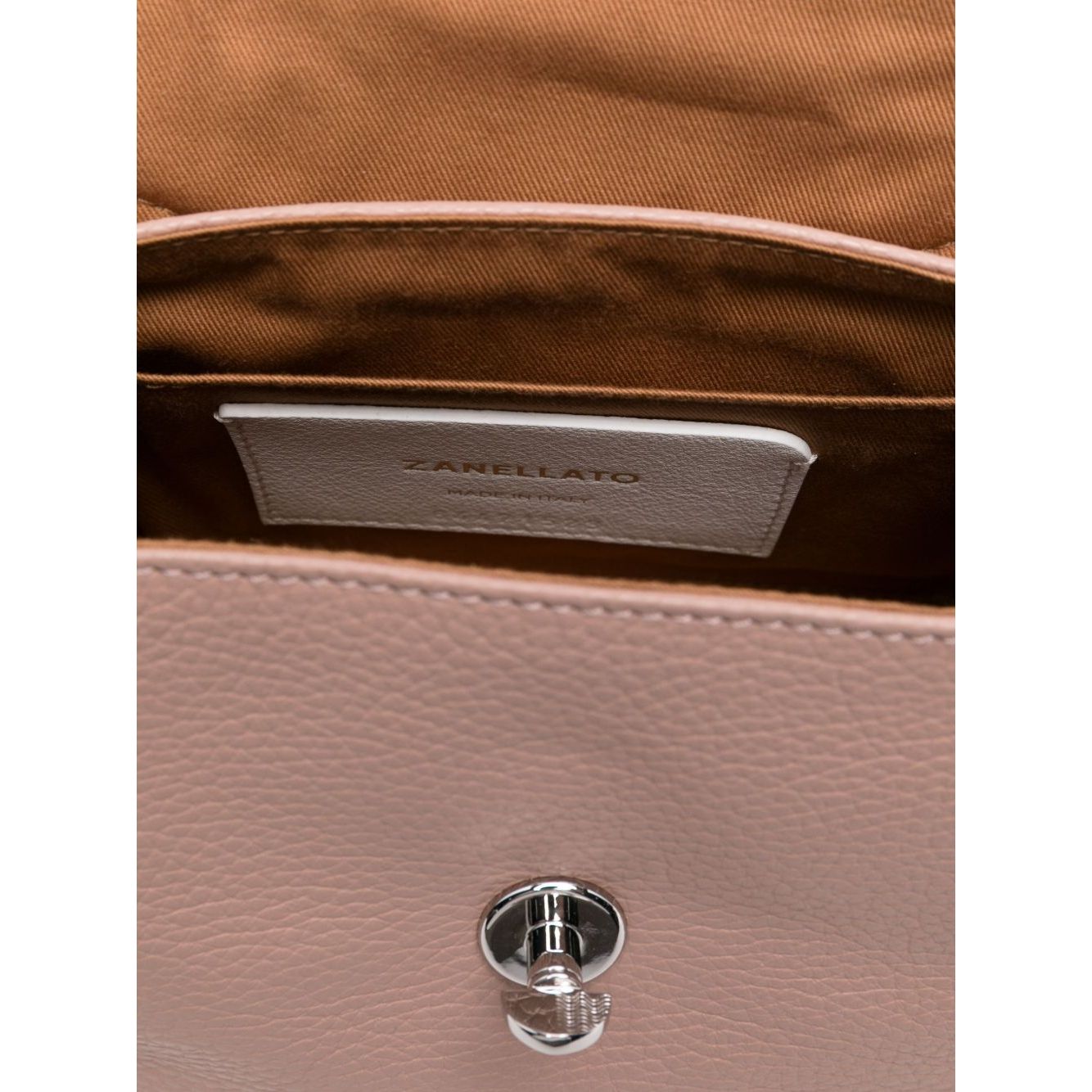 Front view with bag zipped and handles upright.