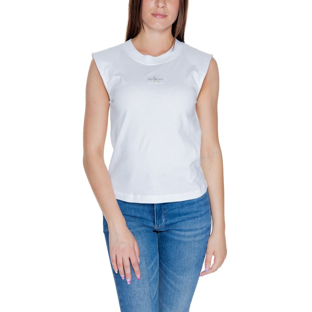 Woman wearing a Calvin Klein Jeans White Cotton T-Shirt with sleeveless design and woven label, paired with denim jeans.