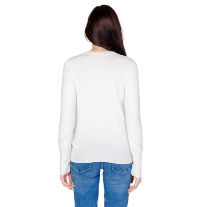 Back view of Guess White Cotton Sweatshirt with long sleeves and subtle logo detail, worn by a woman with long hair and blue jeans.