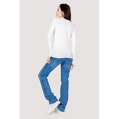Rear view of model wearing Guess White Cotton Sweatshirt with jeans, highlighting embroidered logo and decorative cuff buttons.