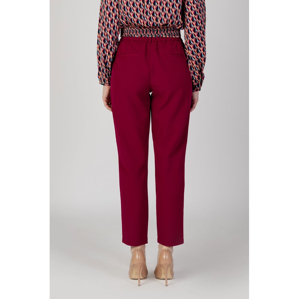 Woman wearing Vila Clothes Bordeaux Polyester Casual Pants, back view showcasing slim fit and elegant design for versatile style.
