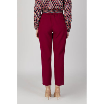 Woman wearing Vila Clothes Bordeaux Polyester Casual Pants, back view showcasing slim fit and elegant design for versatile style.