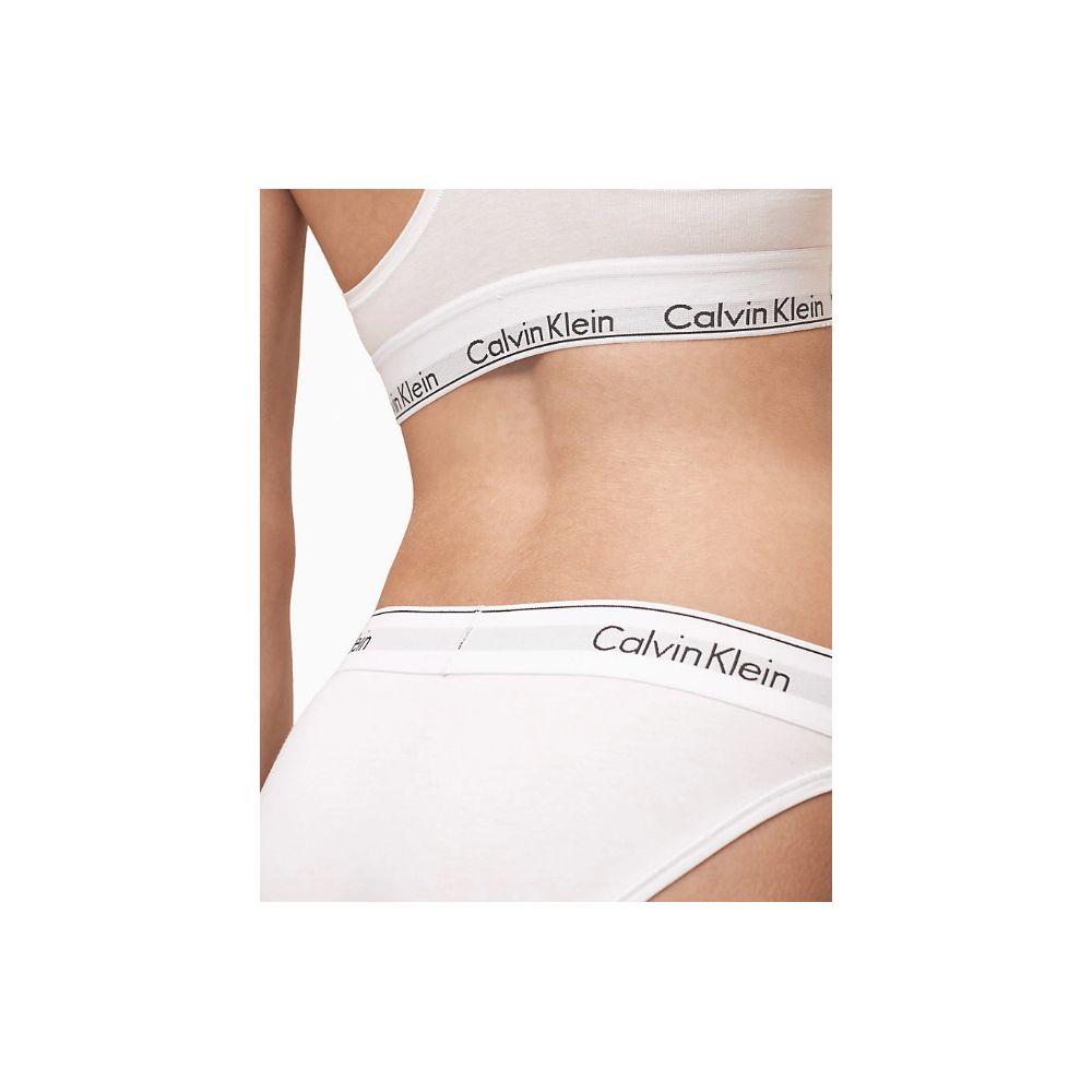 Close-up of Calvin Klein Underwear White Cotton Pantie showcasing logo waistband and comfortable fit, ideal for everyday wear.