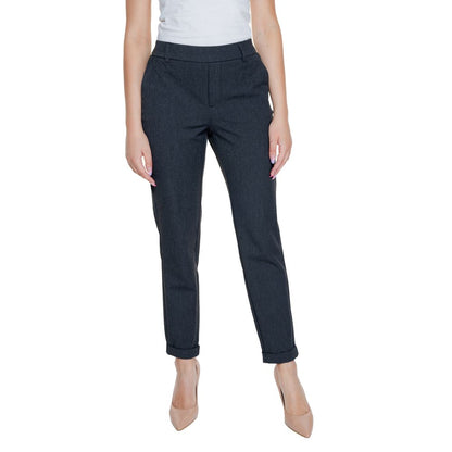 Woman wearing Vero Moda Gray Polyester Casual Pants with turned-up hems standing front view.