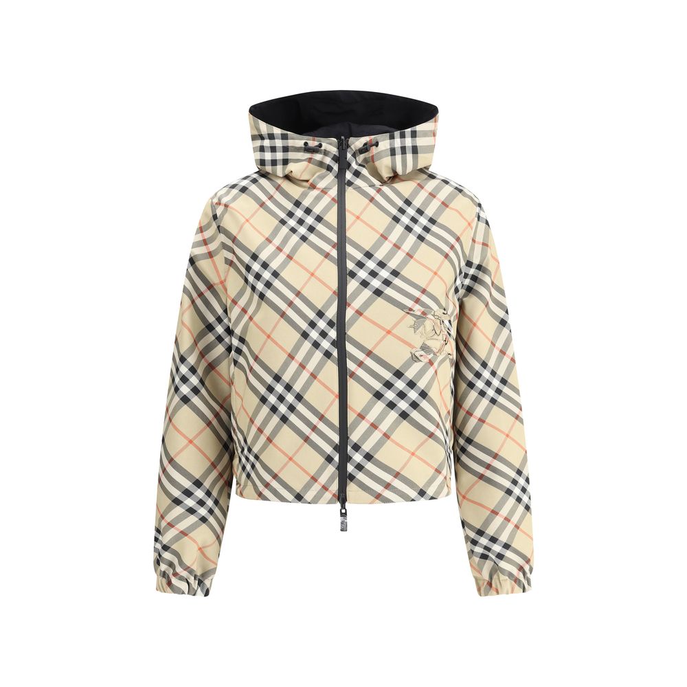 Burberry Brown Polyester Shell Jacket with adjustable hood and reversible Check Archivio pattern. Features elasticized cuffs and zippered pockets.