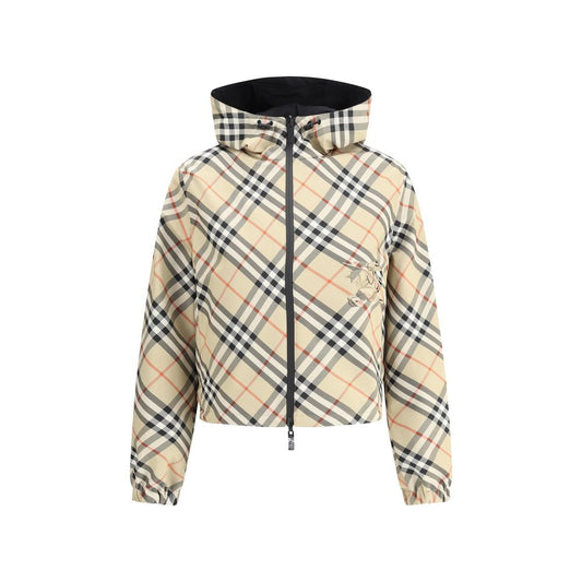 Burberry Brown Polyester Shell Jacket with adjustable hood and reversible Check Archivio pattern. Features elasticized cuffs and zippered pockets.