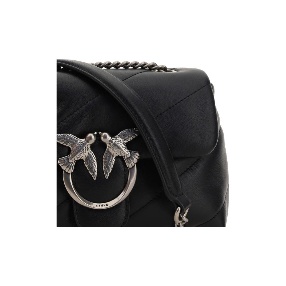 Front view with bag zipped and handles upright.