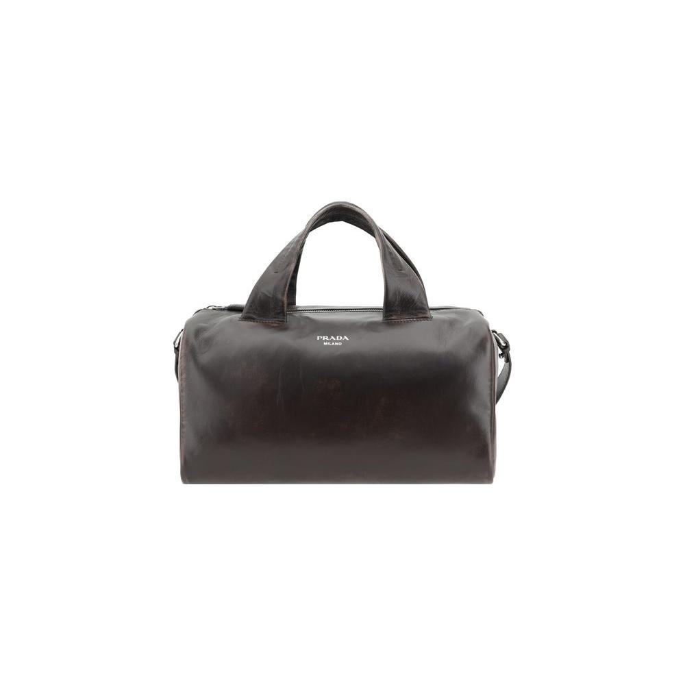 Front view with bag zipped and handles upright.