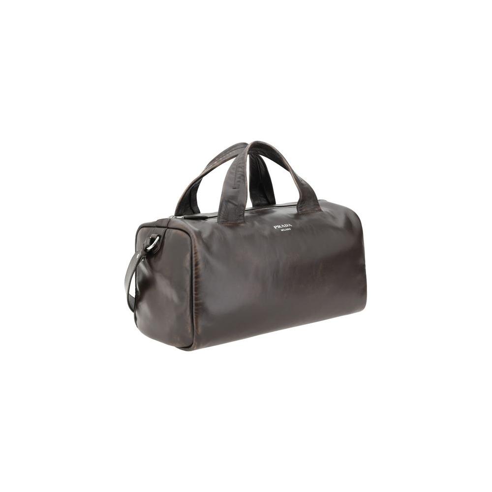 Front view with bag zipped and handles upright.