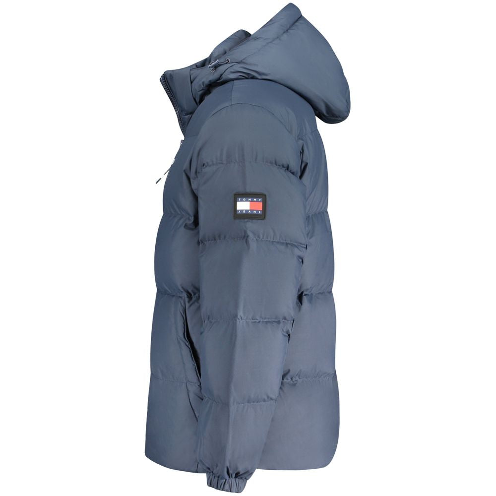 Tommy Hilfiger blue men's jacket with removable hood and logo, made from recycled polyester for sustainable fashion.