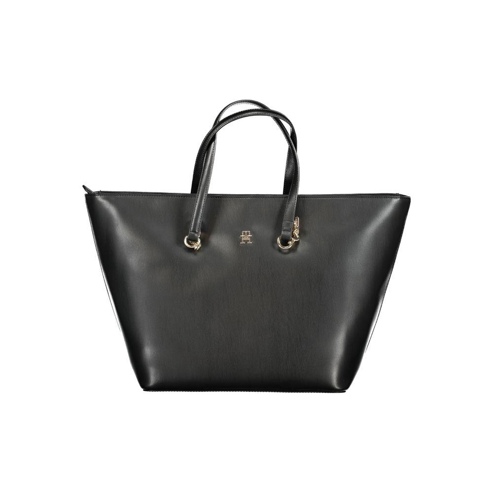 Front view with bag zipped and handles upright.