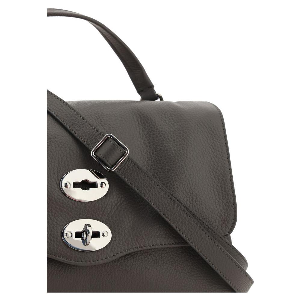 Front view with bag zipped and handles upright.