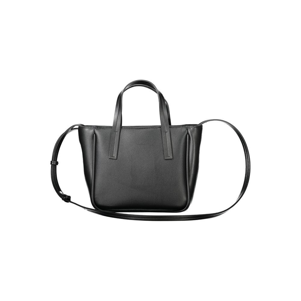 Front view with bag zipped and handles upright.