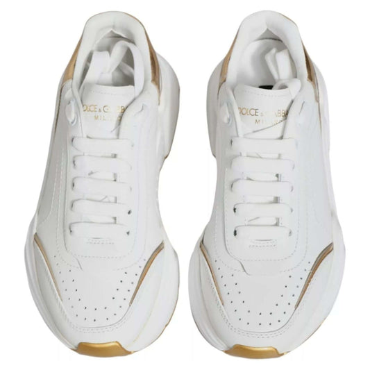 Dolce & Gabbana White Gold Daymaster Low Top Sneakers made of leather with rubber sole, lace-up closure, and logo details.