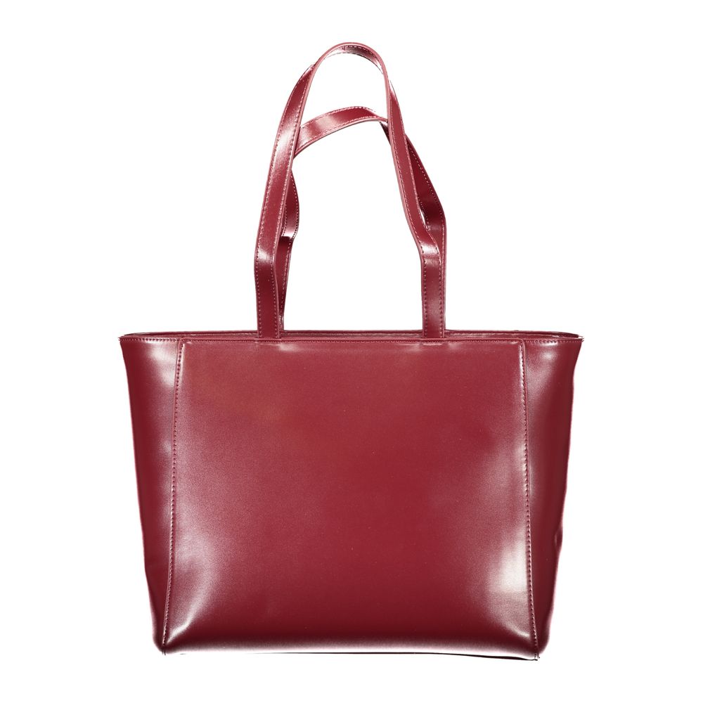 Front view with bag zipped and handles upright.