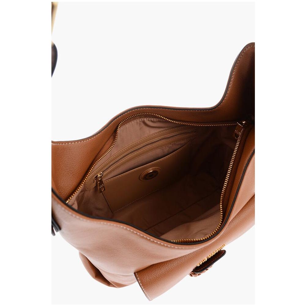 Front view with bag zipped and handles upright.