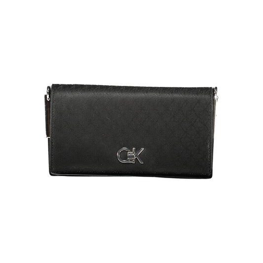 Calvin Klein Black Polyester Women Handbag with logo on front, stylish design, versatile accessory.