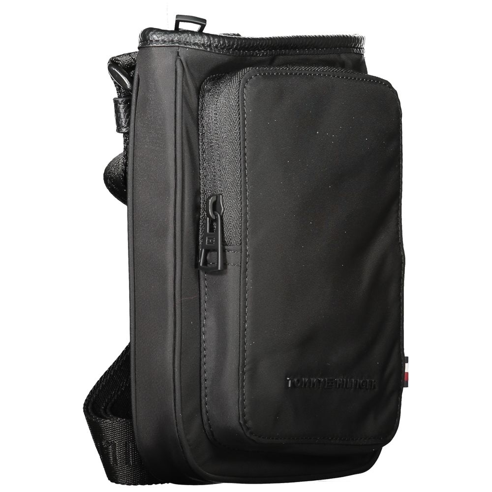 Front view with bag zipped and handles upright.