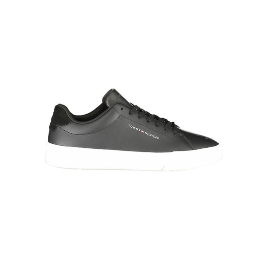 Tommy Hilfiger Black Leather Men Sneaker with contrasting white sole, featuring iconic logo, designed for modern style and comfort.