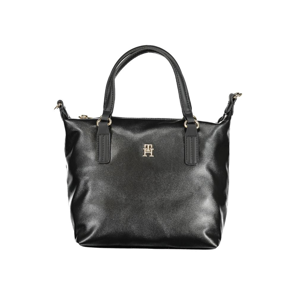 Front view with bag zipped and handles upright.