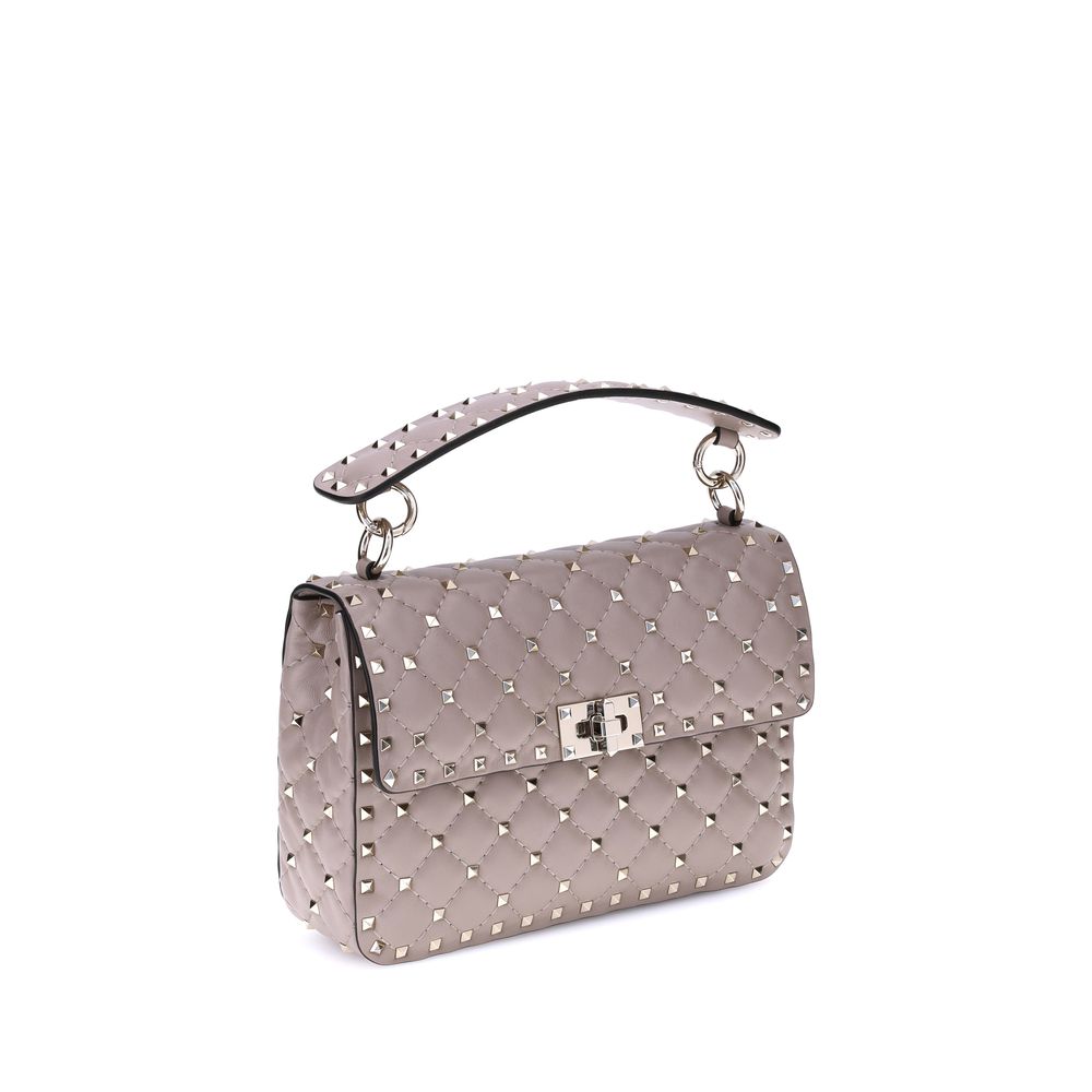 Front view with bag zipped and handles upright.