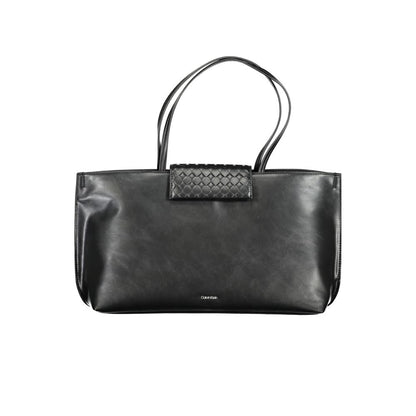 Calvin Klein Black Polyester Handbag with two shoulder handles, internal pocket, contrast details, and magnet closure.