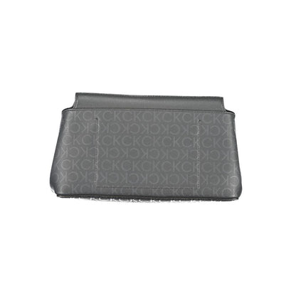 Calvin Klein Black Polyester Handbag with logo pattern, adjustable strap, snap closure, made from 50% recycled polyester.