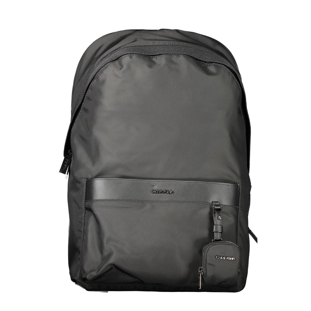 Calvin Klein Black Polyester Backpack with adjustable straps, external pocket, removable coin purse, and laptop spaces.