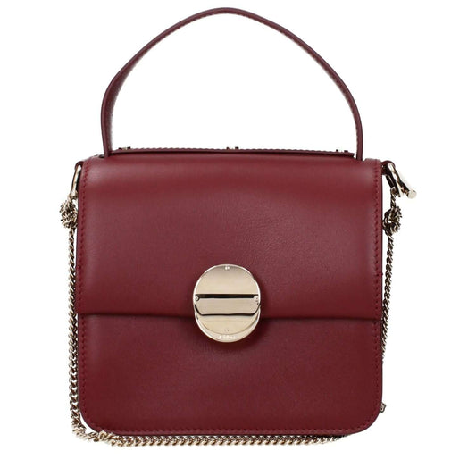 Chloé Red Leather Handbag with front logo and removable shoulder strap, showcasing elegant design and luxury fashion by Chloé.