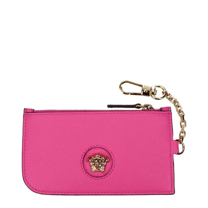 Versace Pink Leather Wallet with fuchsia leather and back logo detail, featuring coin purse design and gold chain clasp.