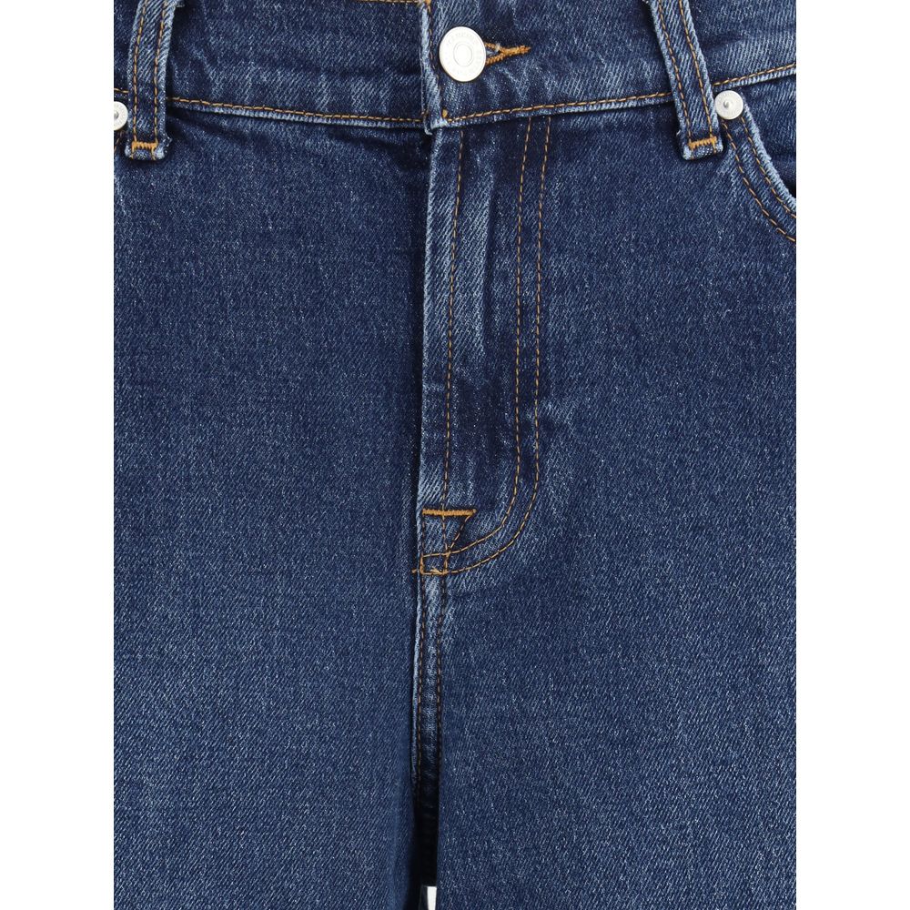 Close-up of 7FOR Blue Cotton Jeans Denim featuring wide leg, five-pocket design, and front zipper with button closure.